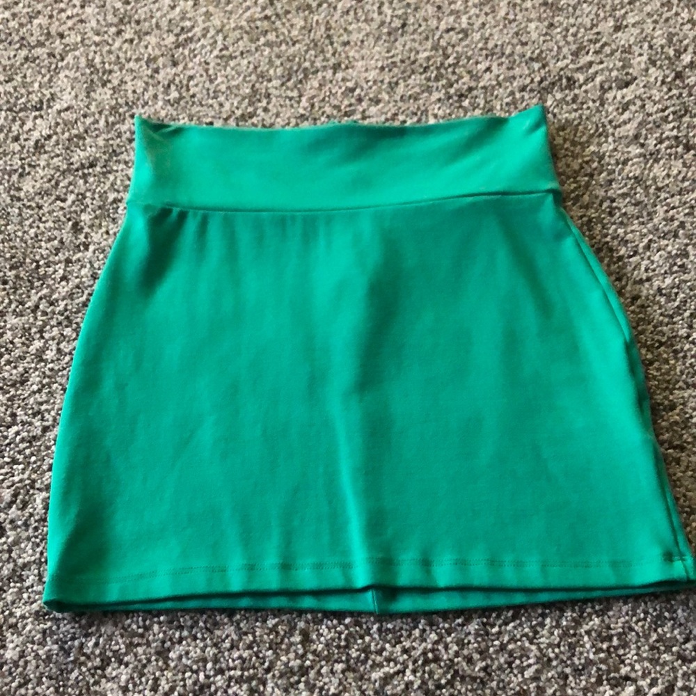 Bebe body con mini skirt